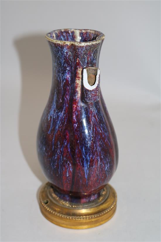 A Chinese flambe-glazed arrow vase, 18th/19th century, total height 21.7cm, faults